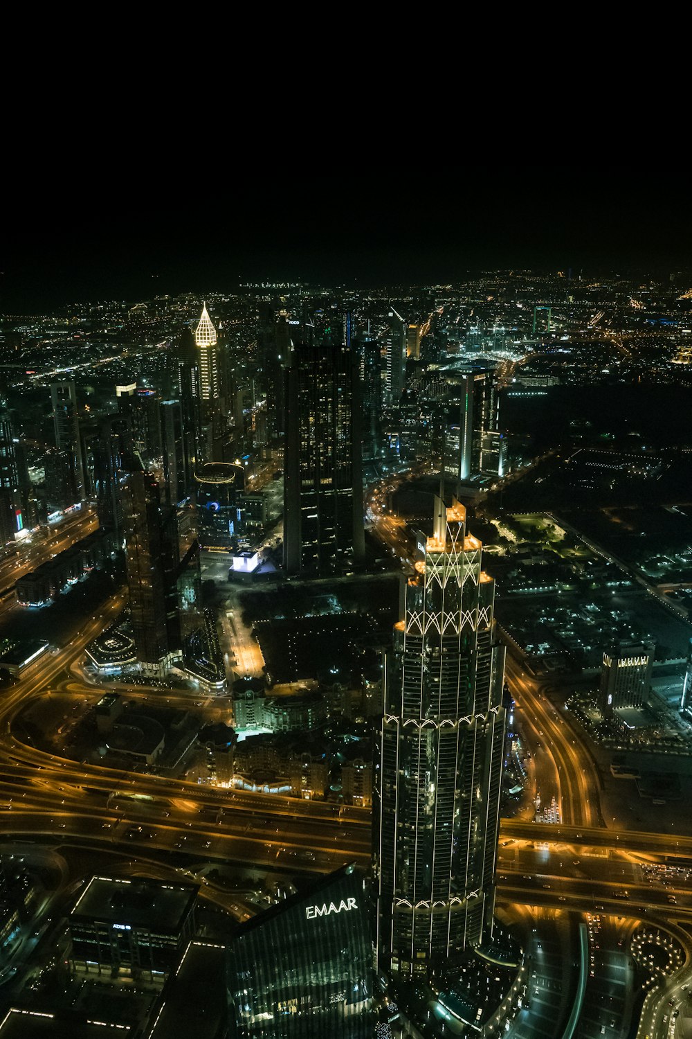 an aerial view of a city at night