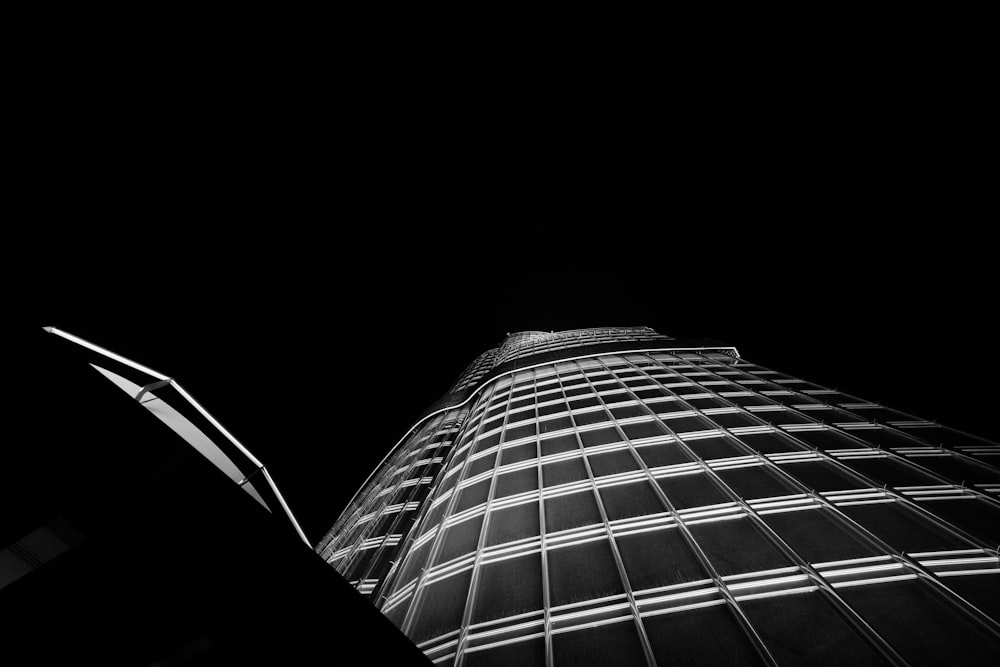 a black and white photo of a tall building