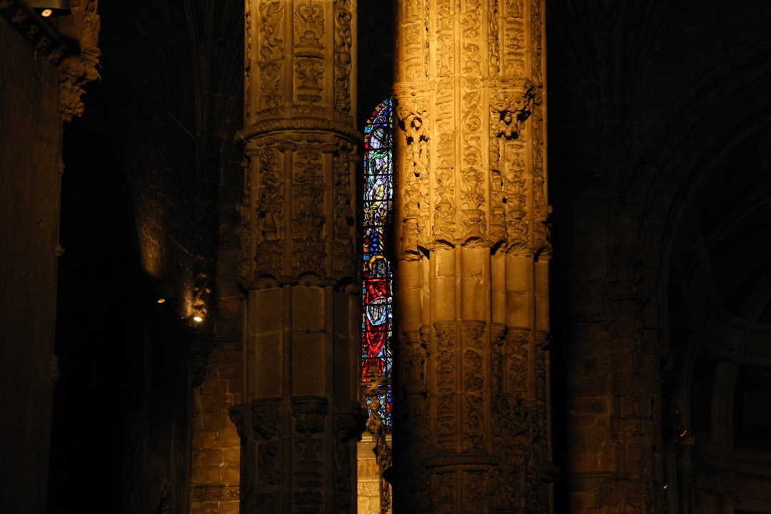 a large cathedral with a stained glass window, Credits to @matmaphotos