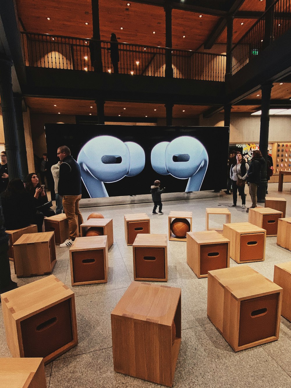 brown wooden boxes in building