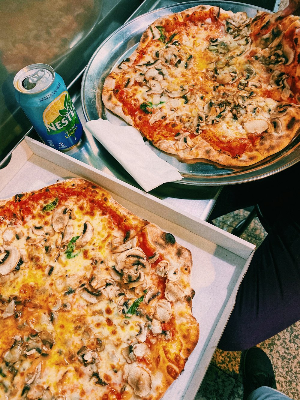 tray and box of pizza