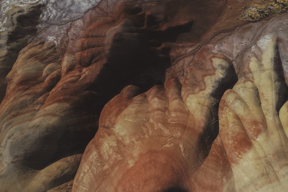 a close up of a rock formation with a sky background