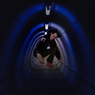 man jumping on hallway