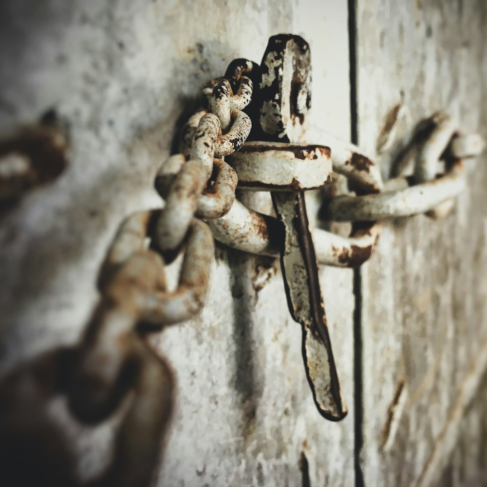 white metal chain on door