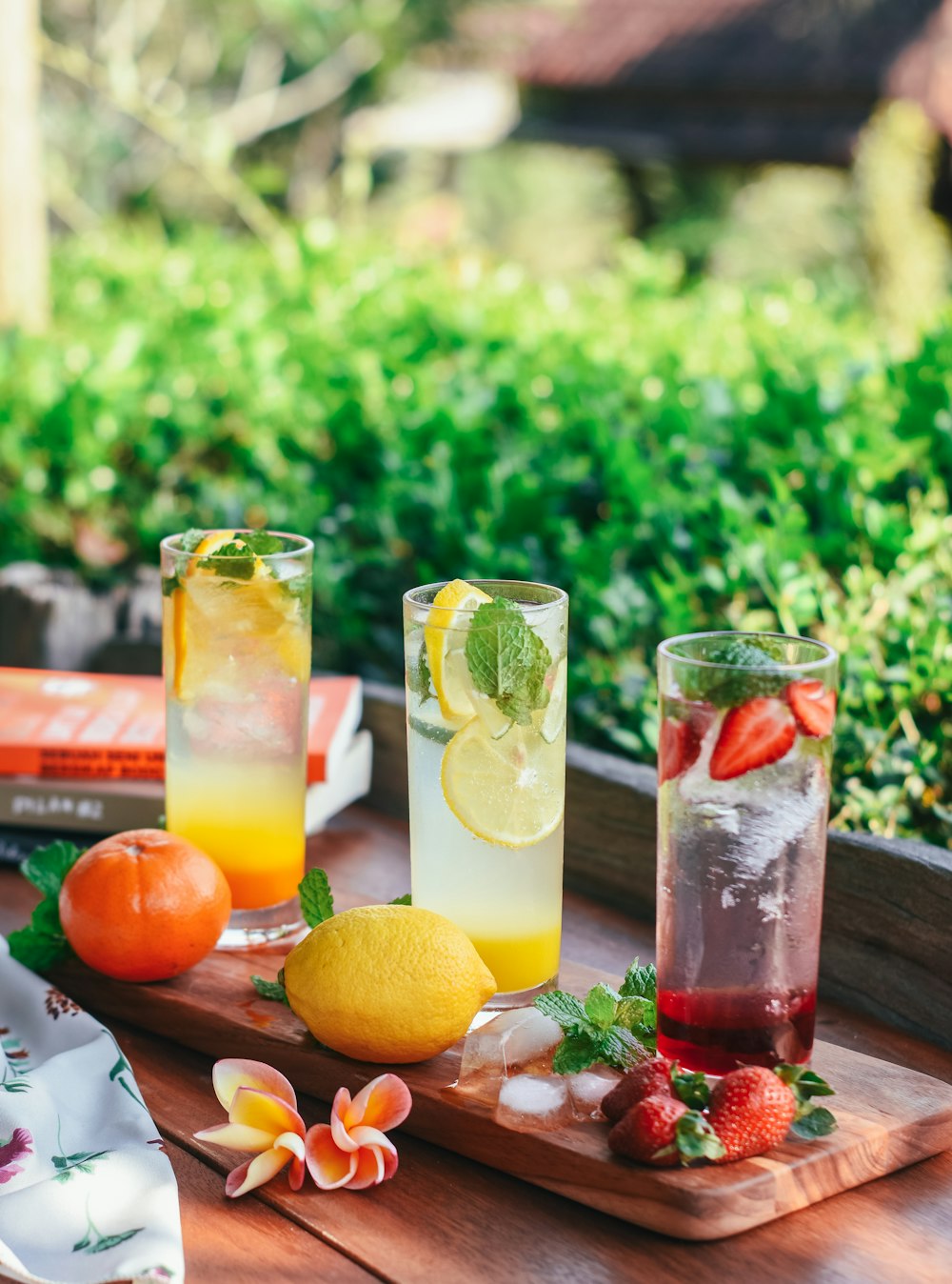 three clear glass beverage cups