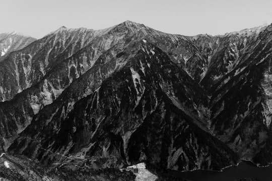 grayscale photography of rocky mountain in Toyama Japan