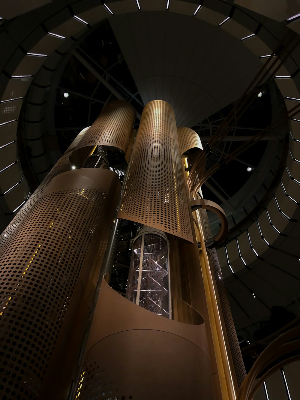 low-angle photograph of brown structure interior