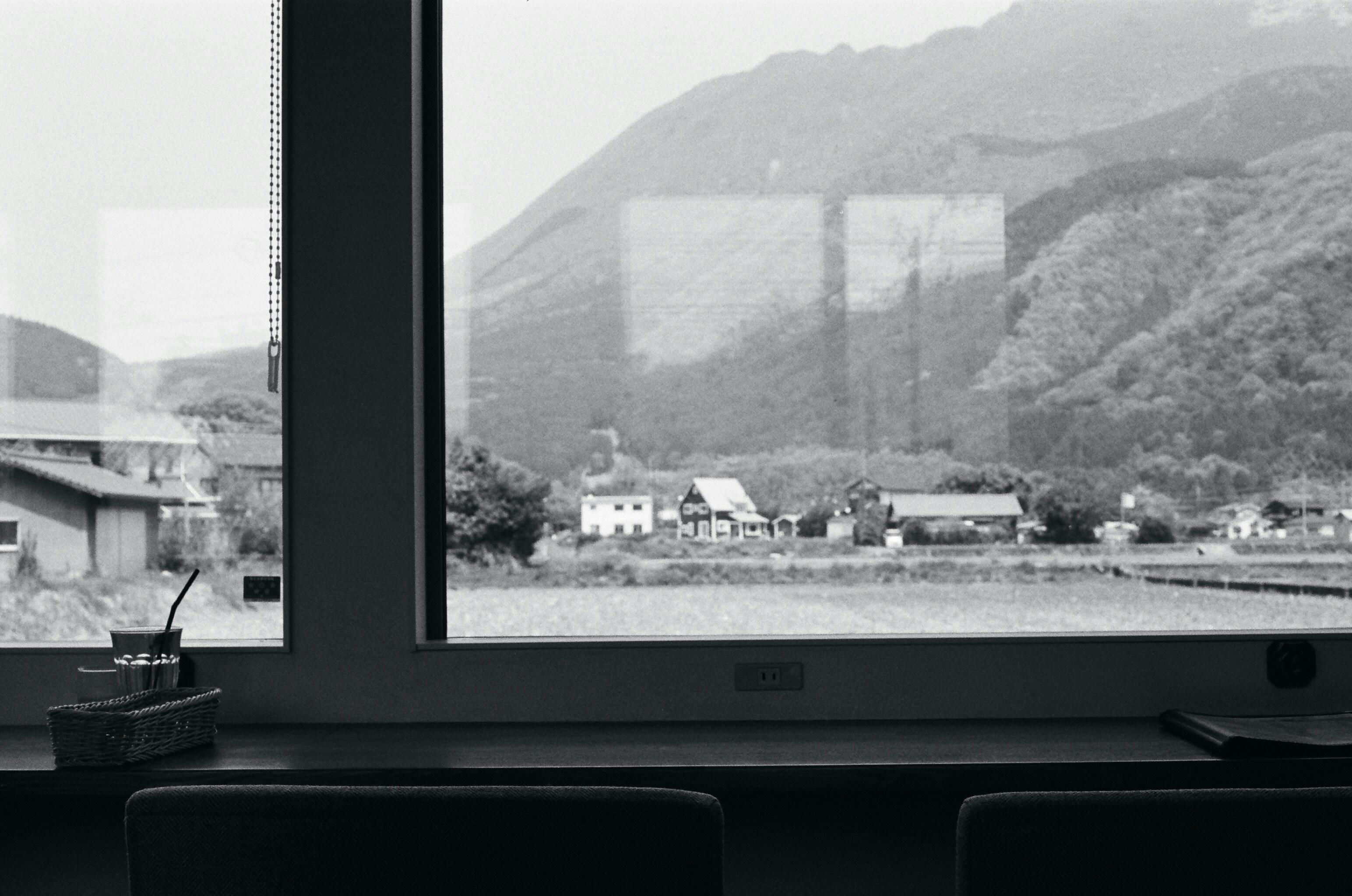 grayscale photography of closed window