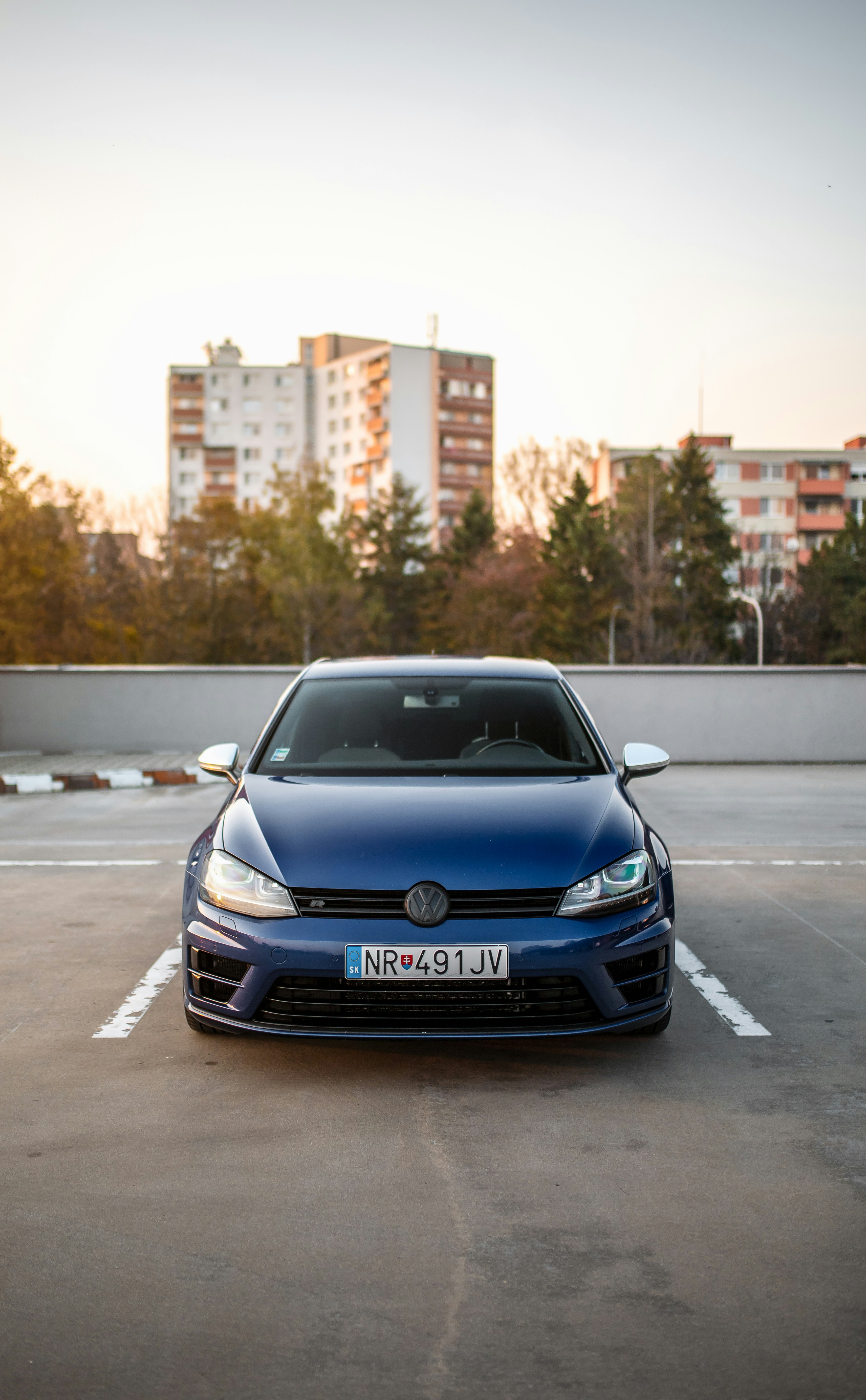 parked blue volksewagen vehicle