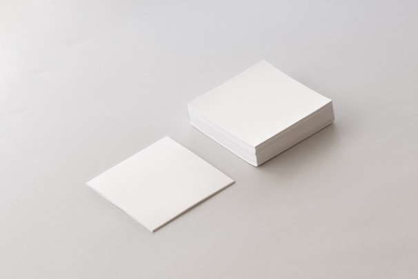 A stack of financial documents neatly organized on a table.