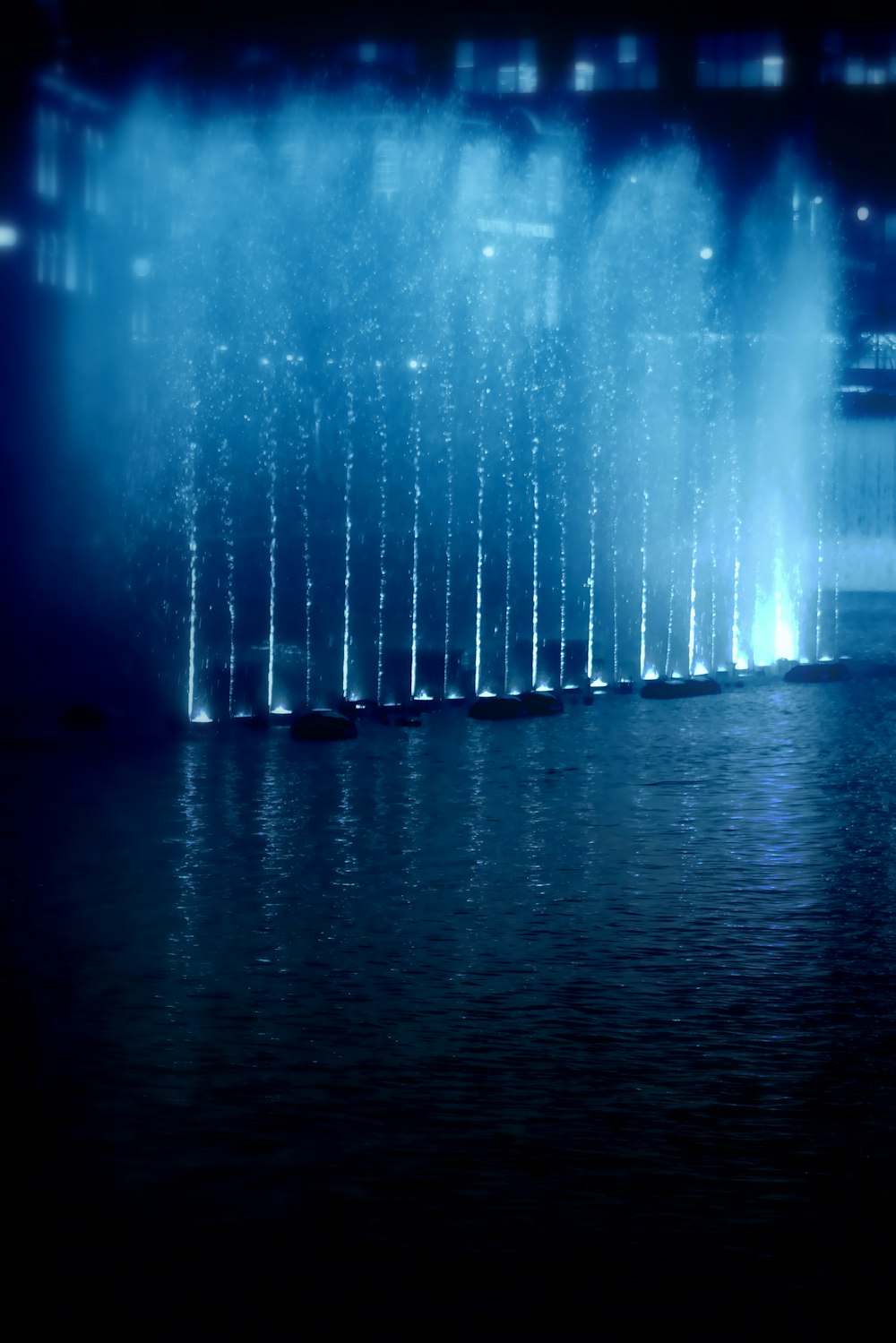 water fountain during night time