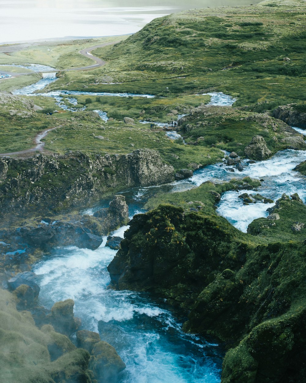 mountain ranges surrounding body of water