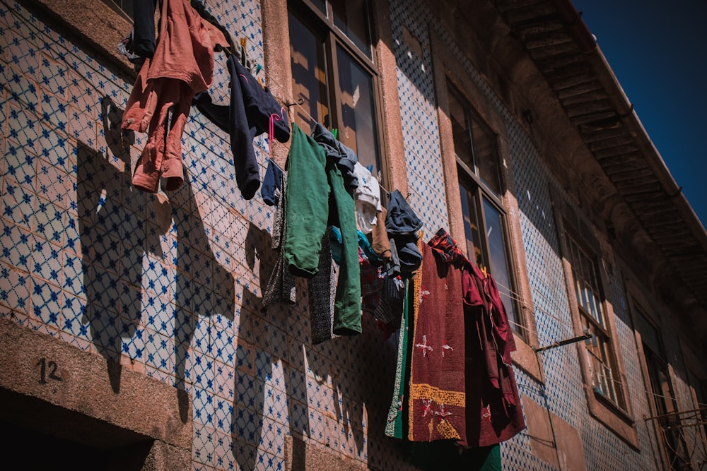 shallow focus photo of textiles hanging near window