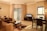 A clean and well-maintained living room with a freshly cleaned sofa.
