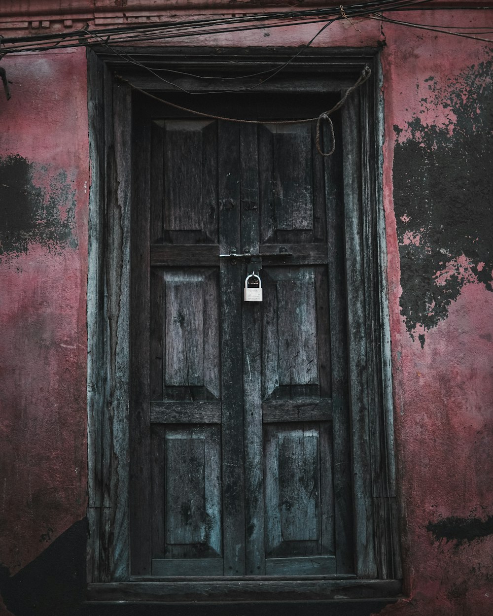 closed gray wooden panel door