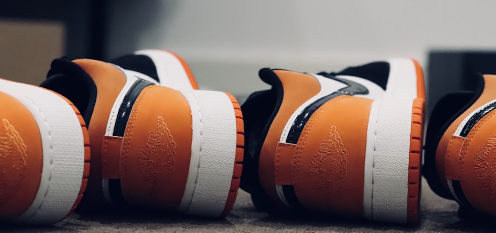 orange-white-and-black Air Jordan shoes