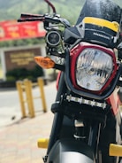 Close-up of a customer signing a financing agreement at Florida Motos.