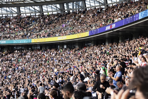 people at the bleachers of the stadium, event agent security Bretagne
