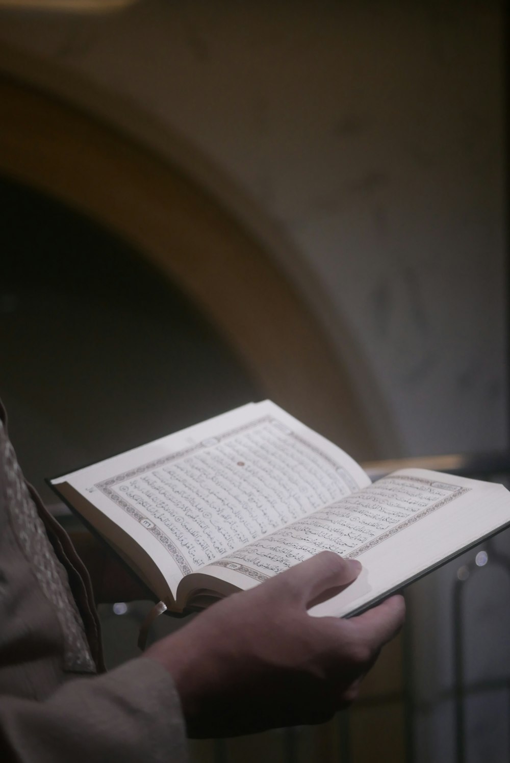 person holding book