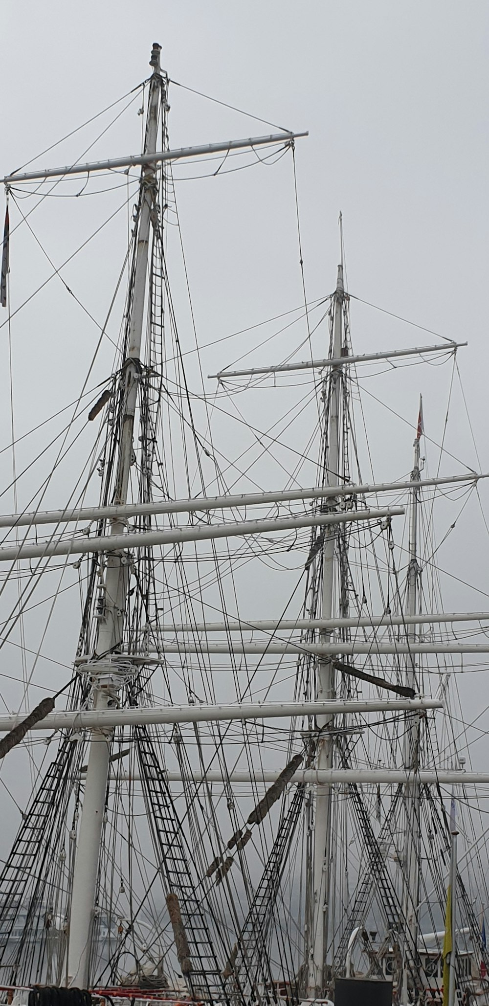low-angle photography of gray boat ship towers