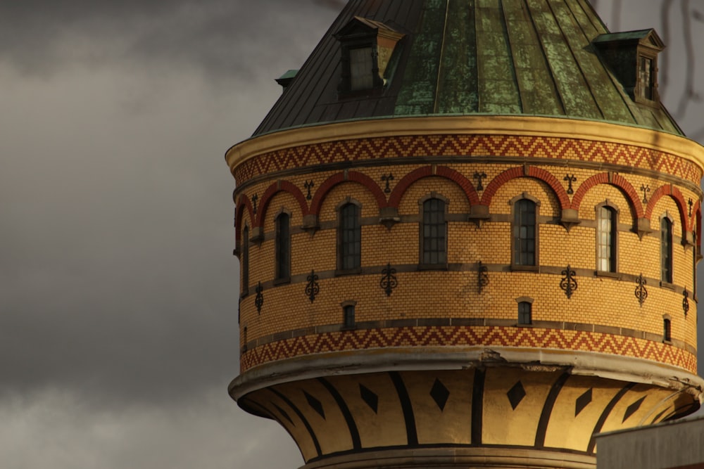 brown and red concrete tower during daytime