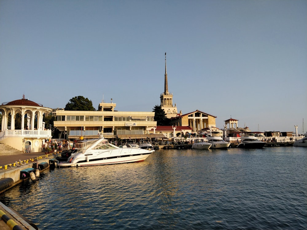 white speedboat on the body of water