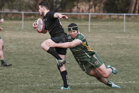 men playing rugby game