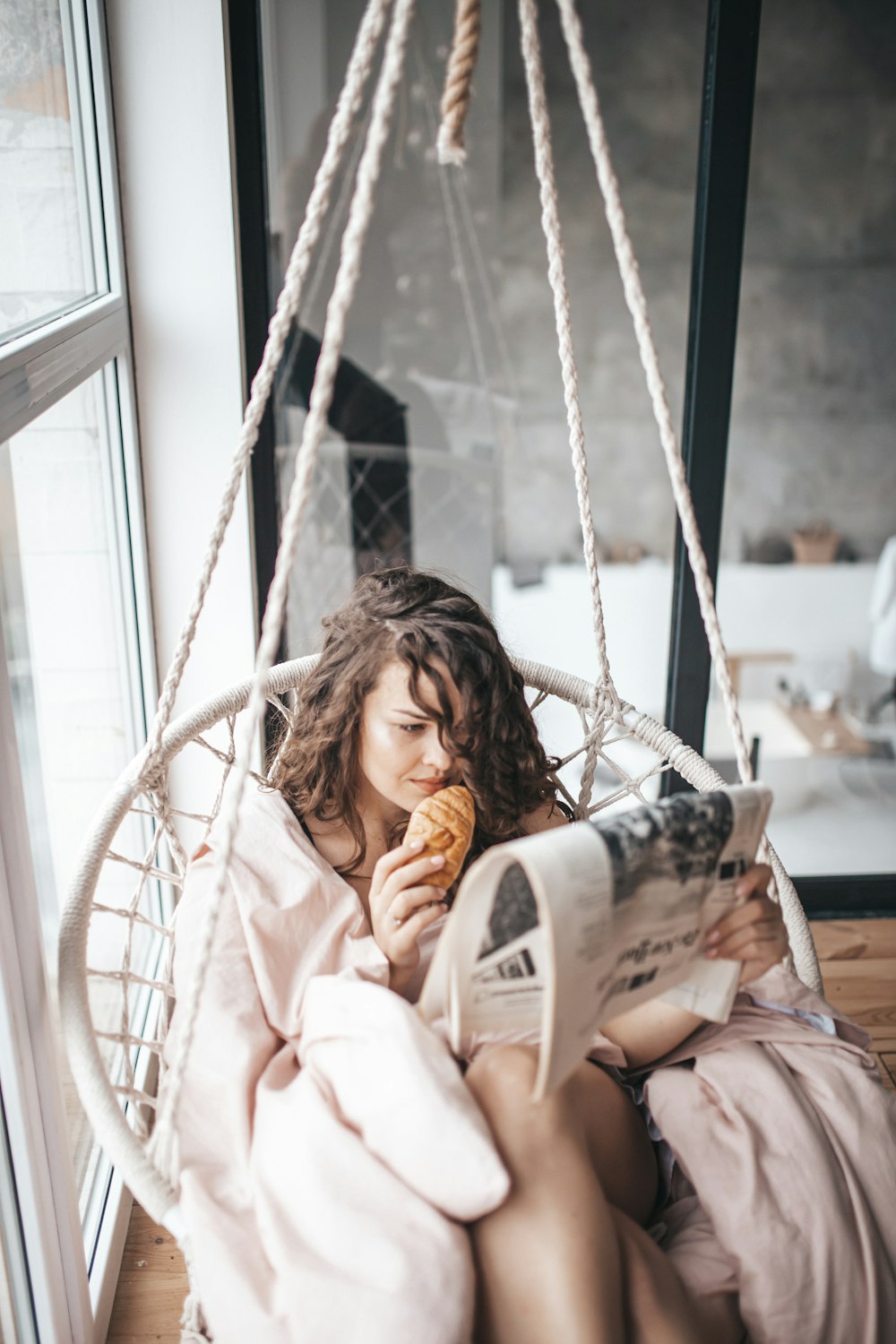 woman reading newspaper