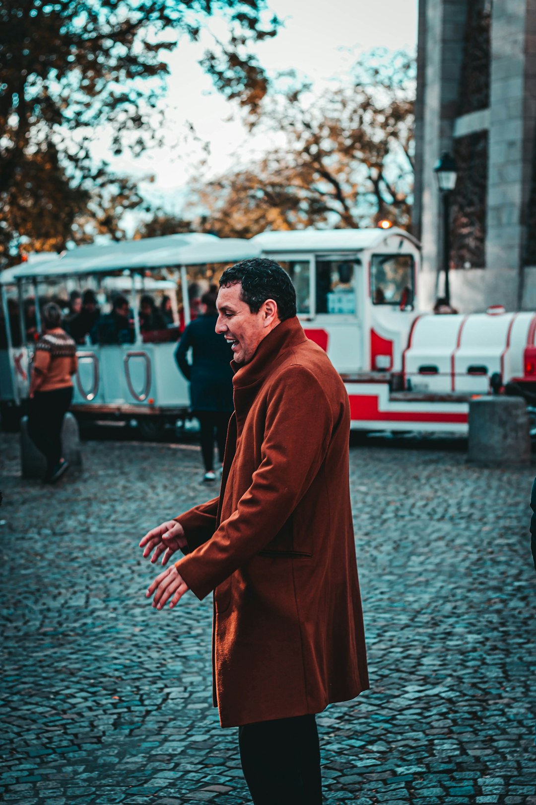 man in brown coat