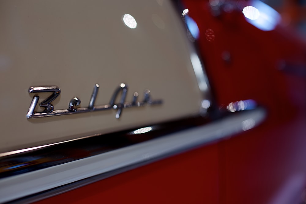 a close up of the emblem on a classic car