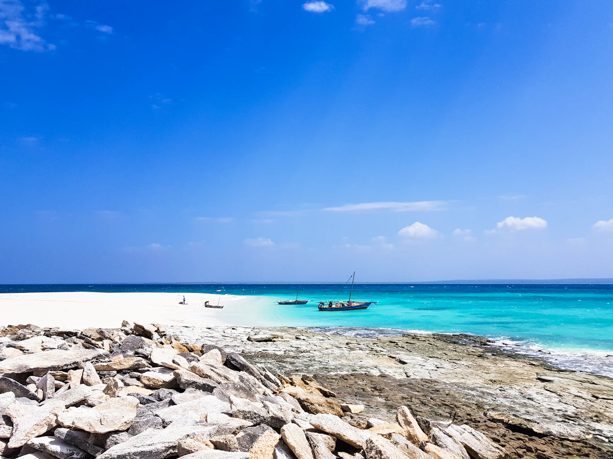 Mozambique landscape — white sand dunes of Bazaruto Island rising above turquoise shallows
