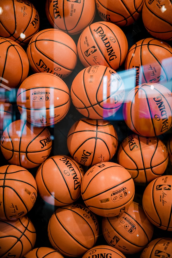Young player practicing shooting form at basketball training