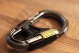 Side view of the red quickdraw keyring holster showing its sleek design.