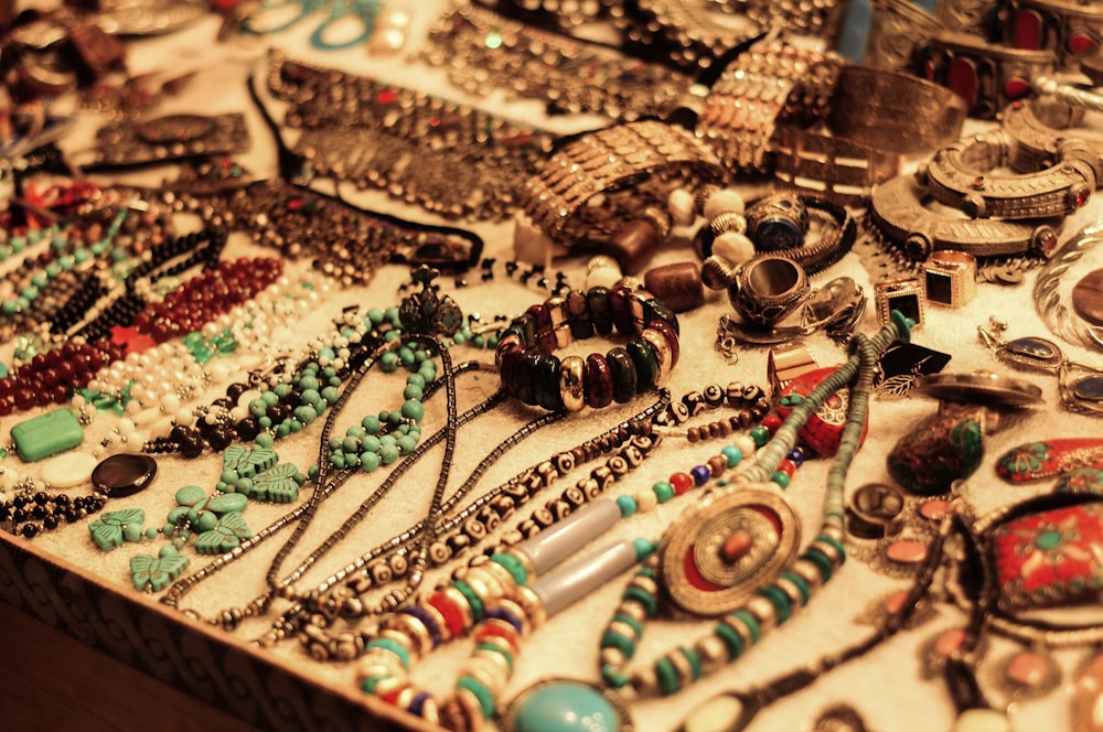 jewelries on white table
