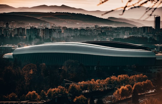 gray concrete stadium in Cluj-Napoca Romania