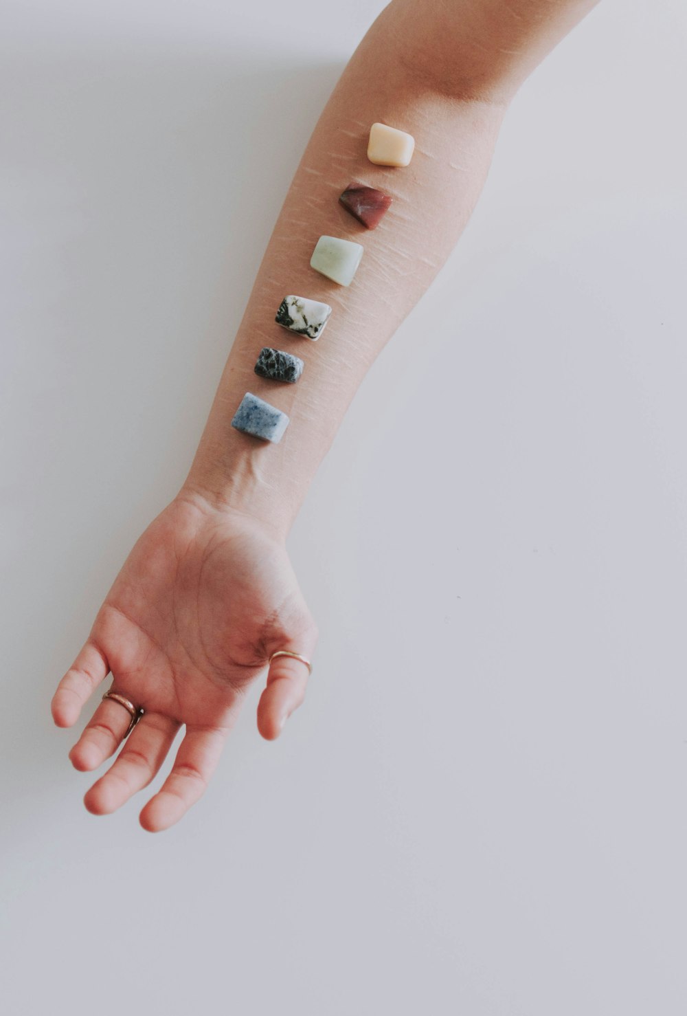 stones on person's arm