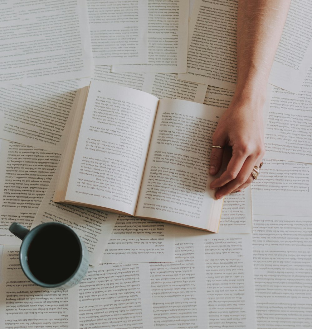 person holding book