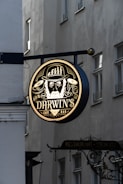 Darwin's building sign during daytime