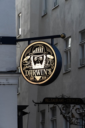 Darwin's building sign during daytime