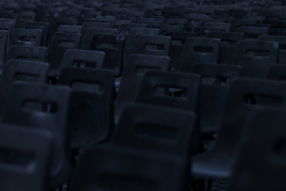 grayscale photography of empty chairs