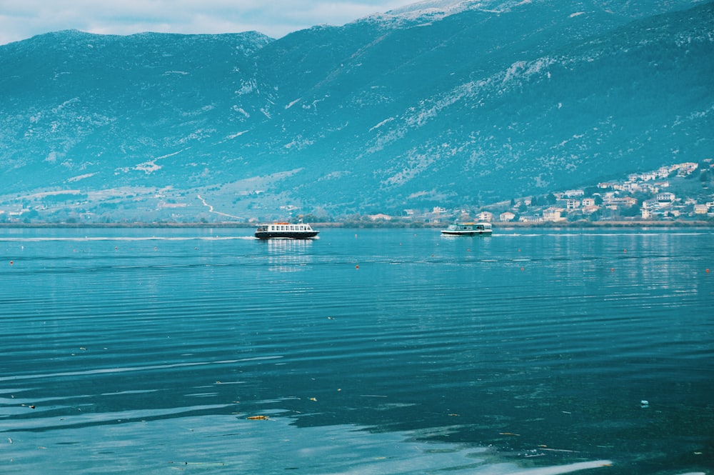 a boat floating on top of a large body of water