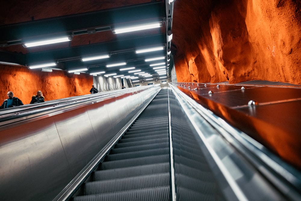 people using escalators