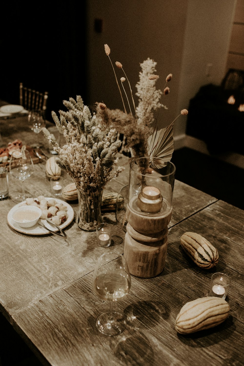 white plate beside vases