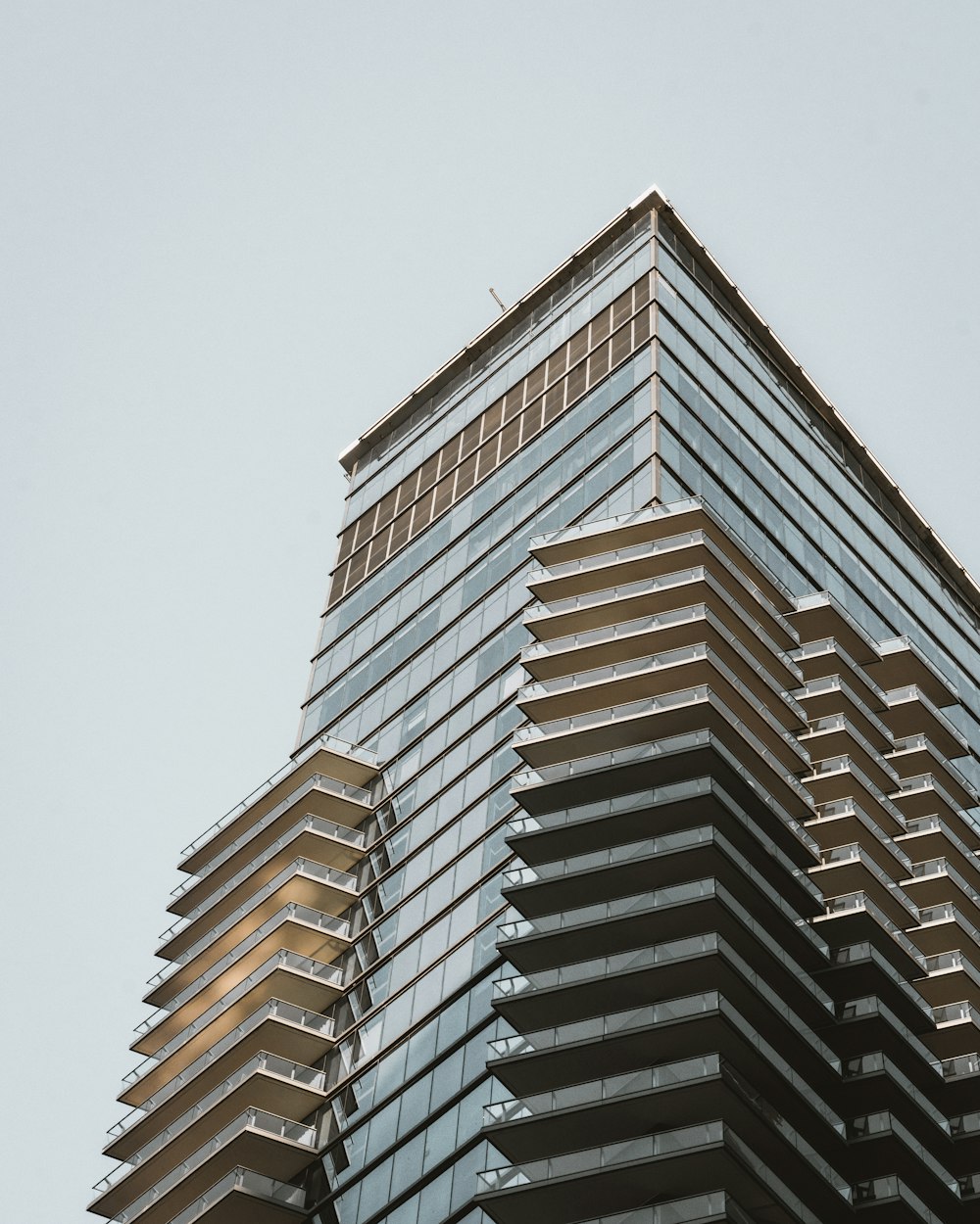 gray and brown high-rise building