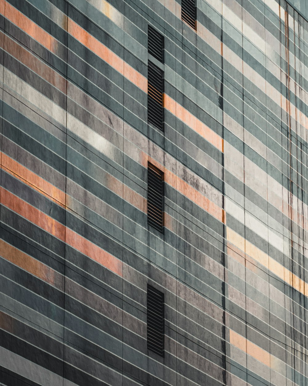 gray and brown building windows