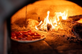 pizza cooked in burne r
