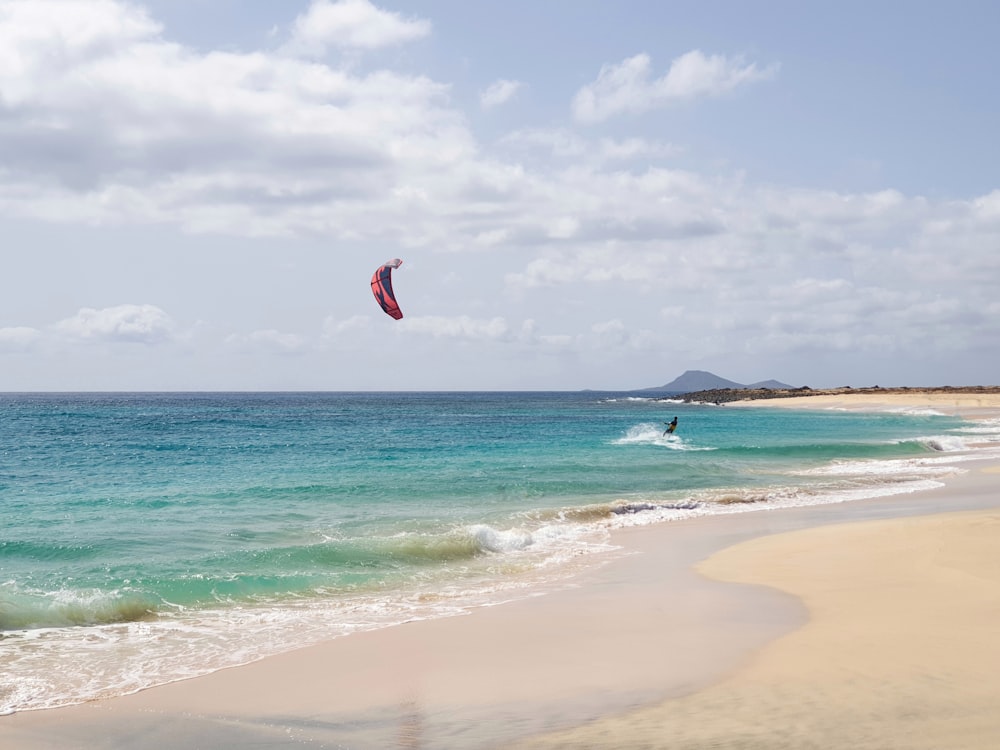 person surfing on seashore