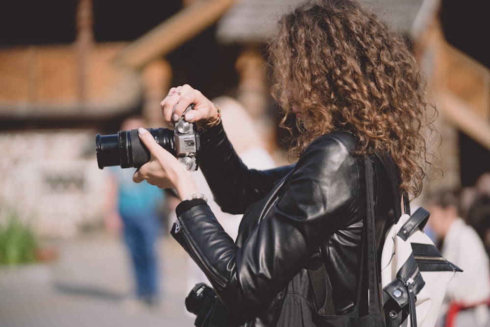 woman with DSLR camera