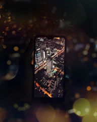 A happy traveler using a smartphone with a Qatar cityscape in the background.