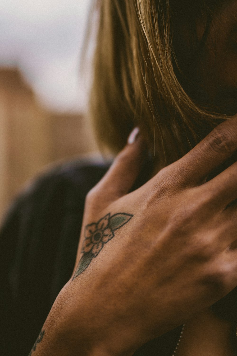 flower hand tattoo